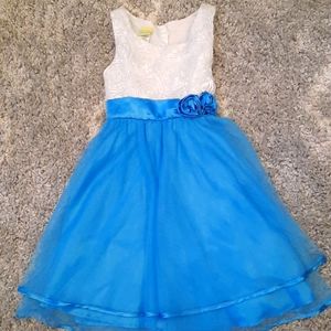 A white and blue kids dress